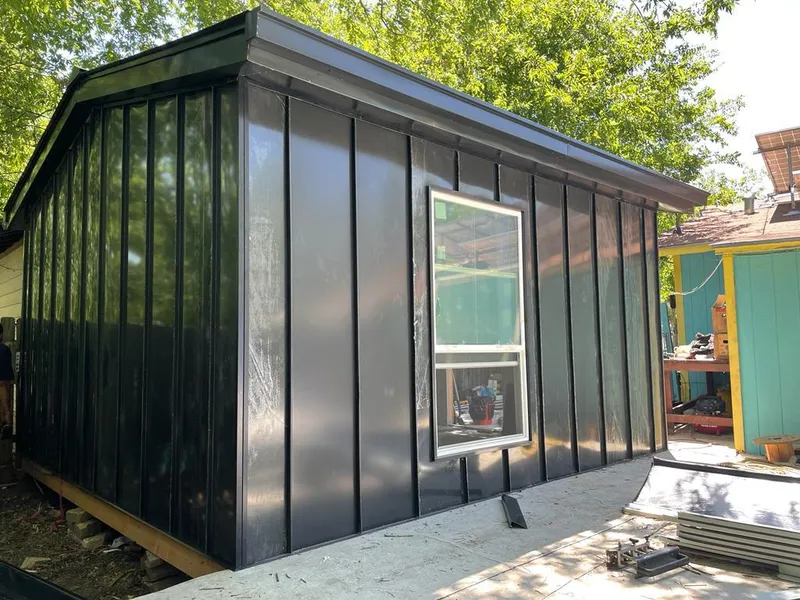 Black standing seam metal wall panels for Metal Roof Installation in Delafield