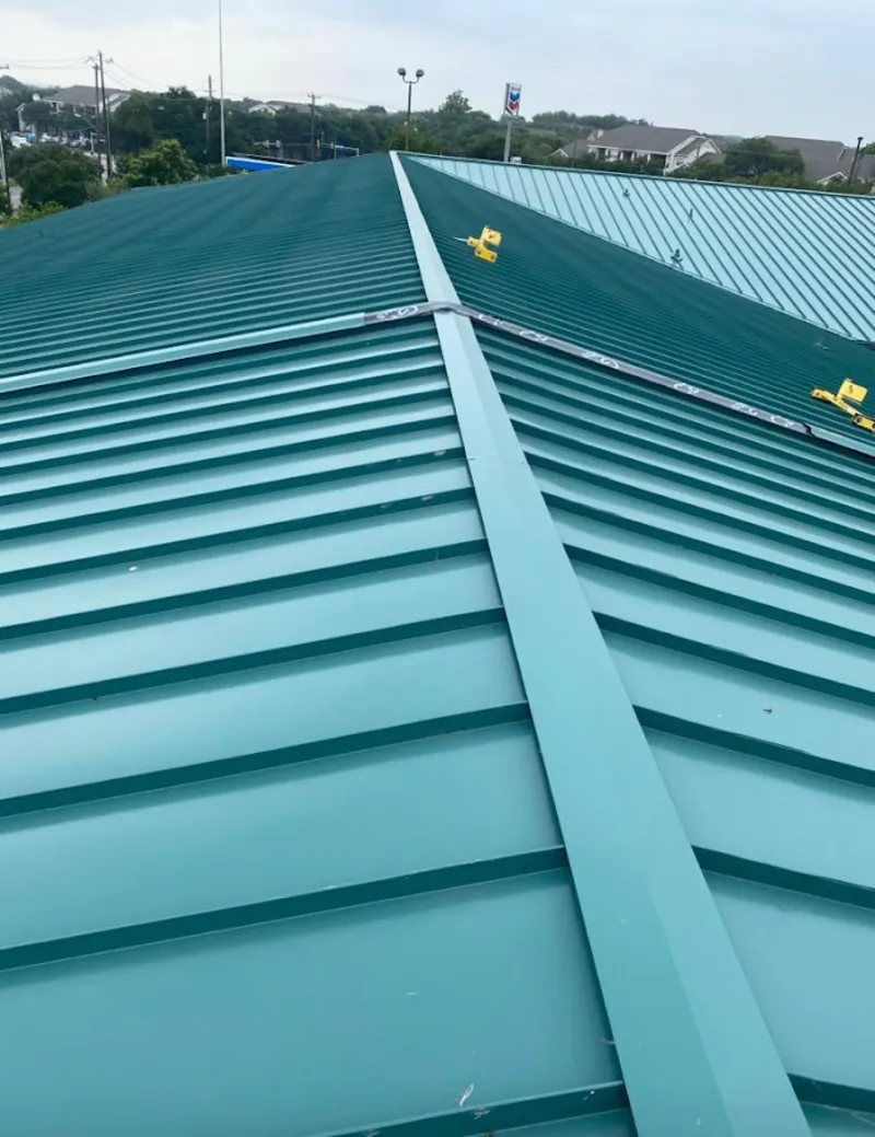Green commercial metal roof ridge and valley for Metal Roof Repair in Delafield