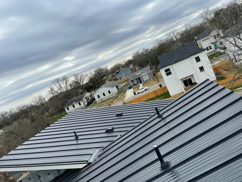 Standing seam metal roof panels with vents for Skylight Repair in Delafield